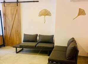 Deluxe Studio Suite, Non Smoking, Terrace | Living area | 42-inch Smart TV with digital channels