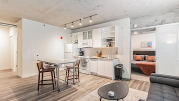 City Apartment, City View | Private kitchen | Full-sized fridge, microwave, stovetop, coffee/tea maker