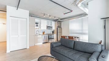 City Apartment, Multiple Beds, City View | Living area | 50-inch Smart TV with digital channels, Netflix, Hulu