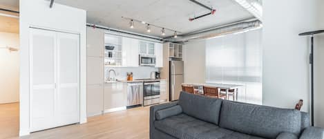 Appartement Ville, plusieurs lits, vue ville | Coin séjour