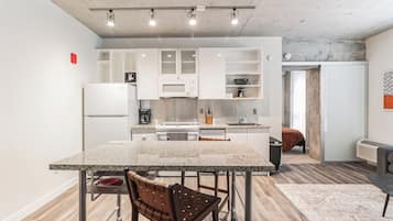 City Apartment, City View | Private kitchen | Full-sized fridge, microwave, stovetop, coffee/tea maker