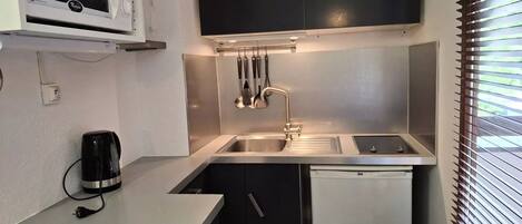 Fridge, microwave, electric kettle, toaster