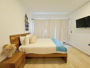 Deluxe appartement, uitzicht op tuin | 1 slaapkamer, verduisterende gordijnen, gratis wifi