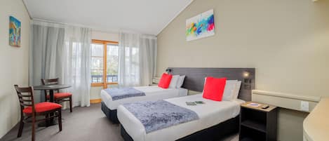 Classic Twin Room | Blackout drapes, iron/ironing board, WiFi (free), bed sheets