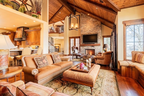 Experience luxury in this 4-bedroom cabin with stunning limited mountain views in Park City.