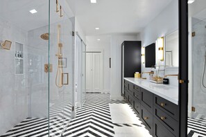 Shower, eco-friendly toiletries, hair dryer, towels