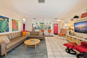 TV - Tropical Gateway—Colorful Pool Retreat w/ Fenced Yard, Beach Gear & Walk-to-Beach Access (Indian Rocks Beach)