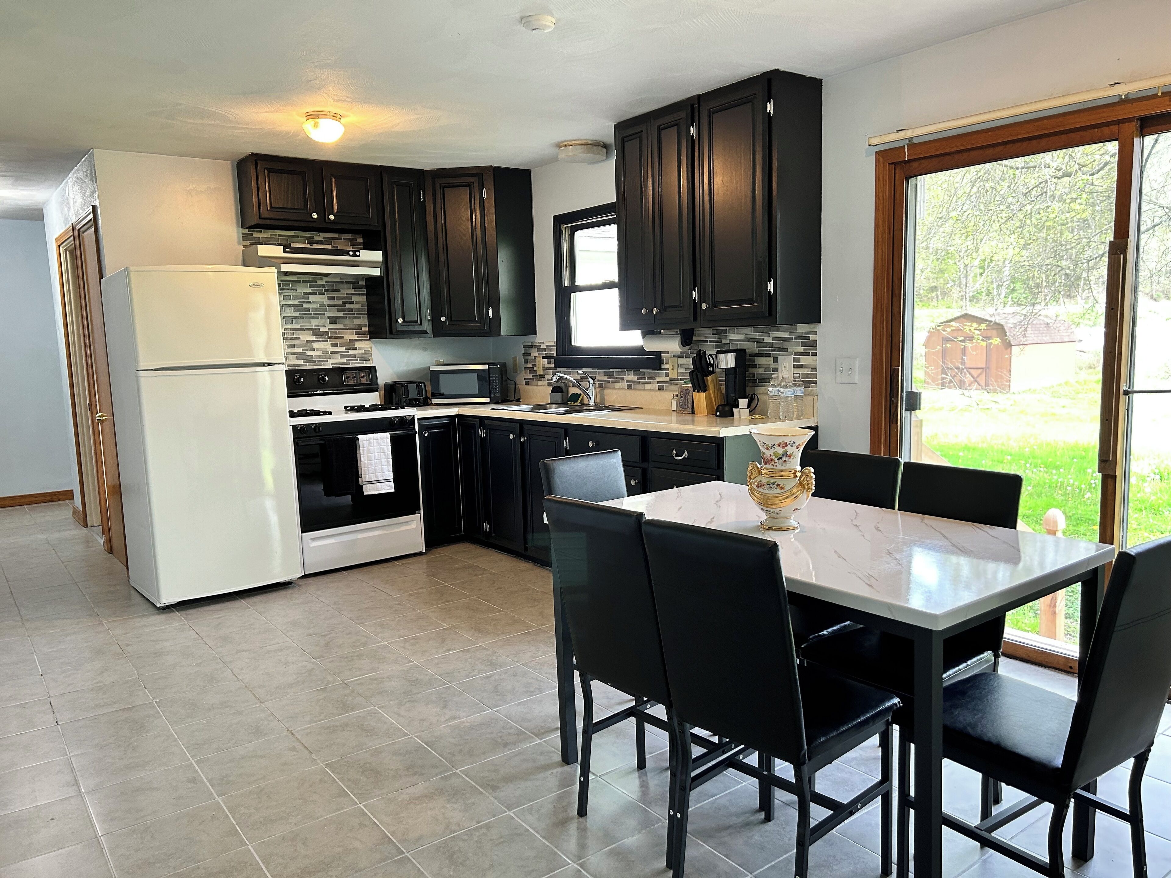 Discover your family's perfect retreat in Vestal with this cozy brick house!