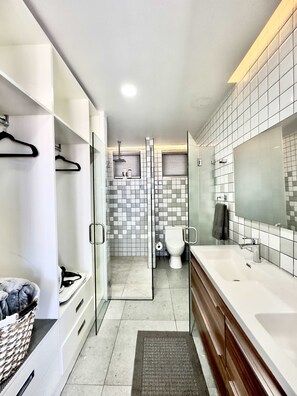 Shower, hair dryer, towels, shampoo