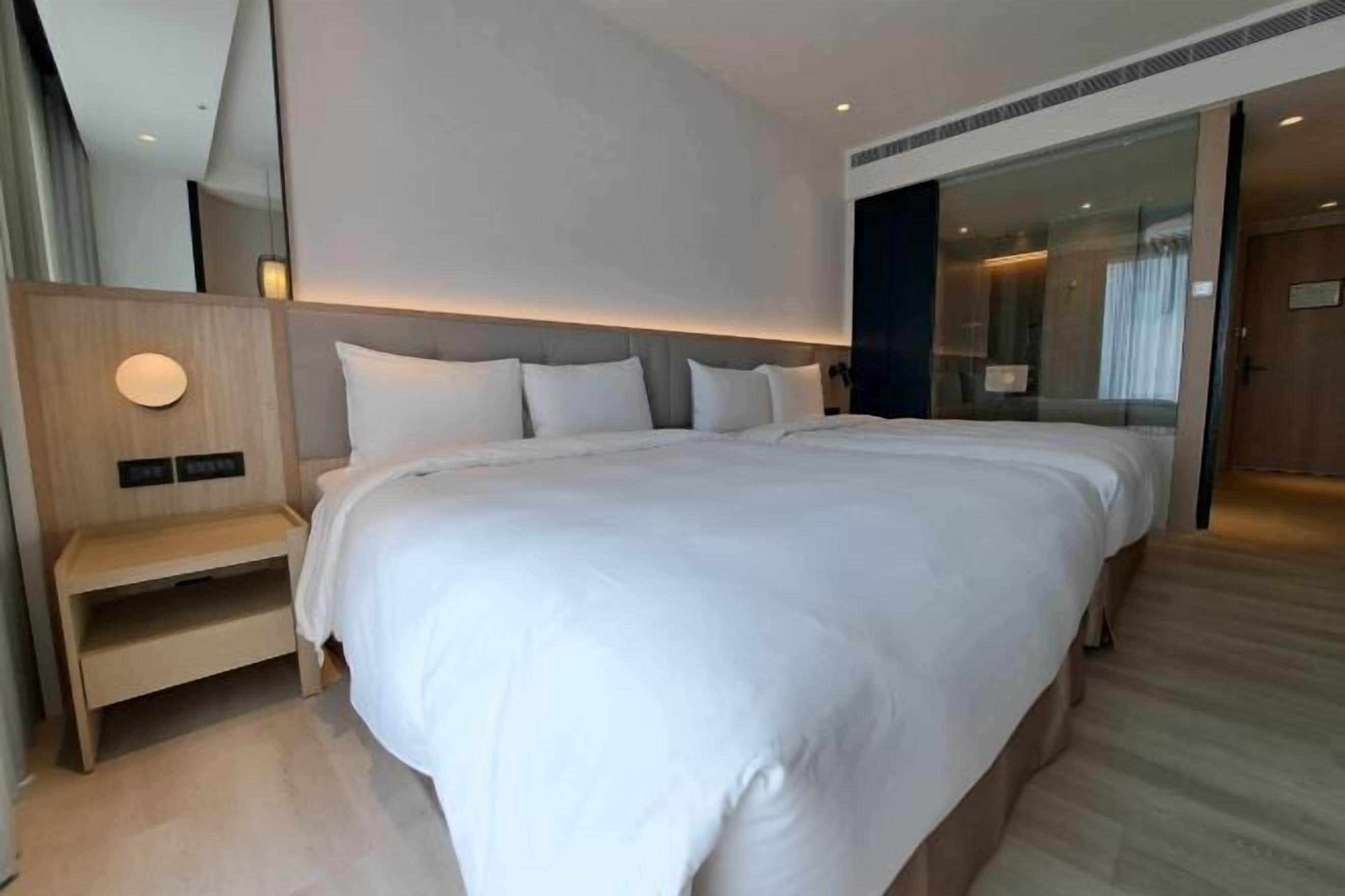 Een kluis op de kamer, gratis wifi, beddengoed