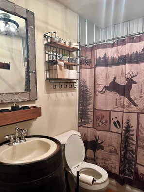 Hair dryer, towels, soap, shampoo