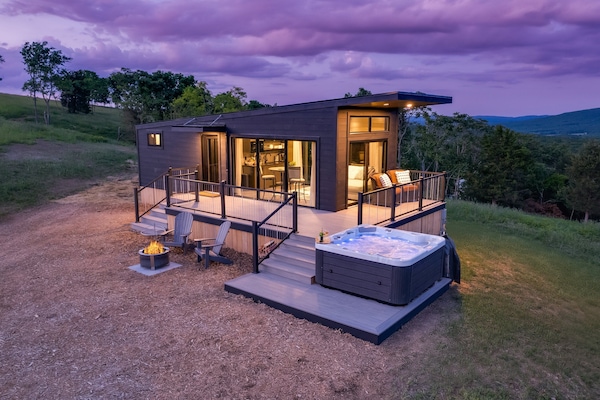 From a hot tub, to the fire pit, to the gorgeous outdoor furniture sets... this home in paradise has it all!