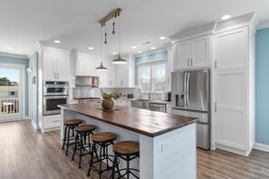 Fridge, microwave, oven, stovetop - NEW to Proactive Vacations "153 Sailfish" is a 3 Bedroom, 2 Bathroom Home with Private Pool! (Holden Beach)