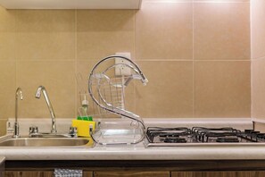 Microwave, stovetop, cookware/dishes/utensils