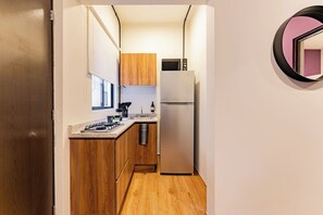 Fridge, microwave, stovetop, cookware/dishes/utensils
