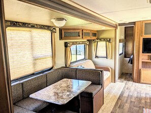 Living area - Spacious 2 Bedroom Bunkhouse RV, Farm View, Family and Dog Friendly (Tuttle)