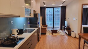 Apartamento superluxo, 1 quarto, cozinha | Área de estar