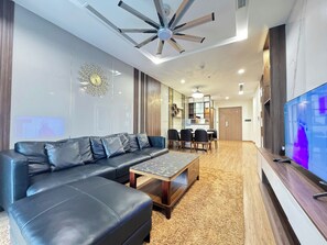 Deluxe Apartment, 3 Bedrooms, Kitchen | Living area