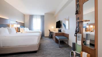 Desk, blackout curtains, iron/ironing board, bed sheets