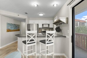 Fridge, microwave, oven, stovetop - Condo near the water with pool, tennis, balcony, grill, washer/dryer, & AC (Panama City Beach)