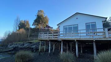 Comfort huisje, uitzicht op strand | Terras