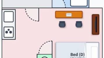 A hotel room layout with a bed, washroom, and bathroom.