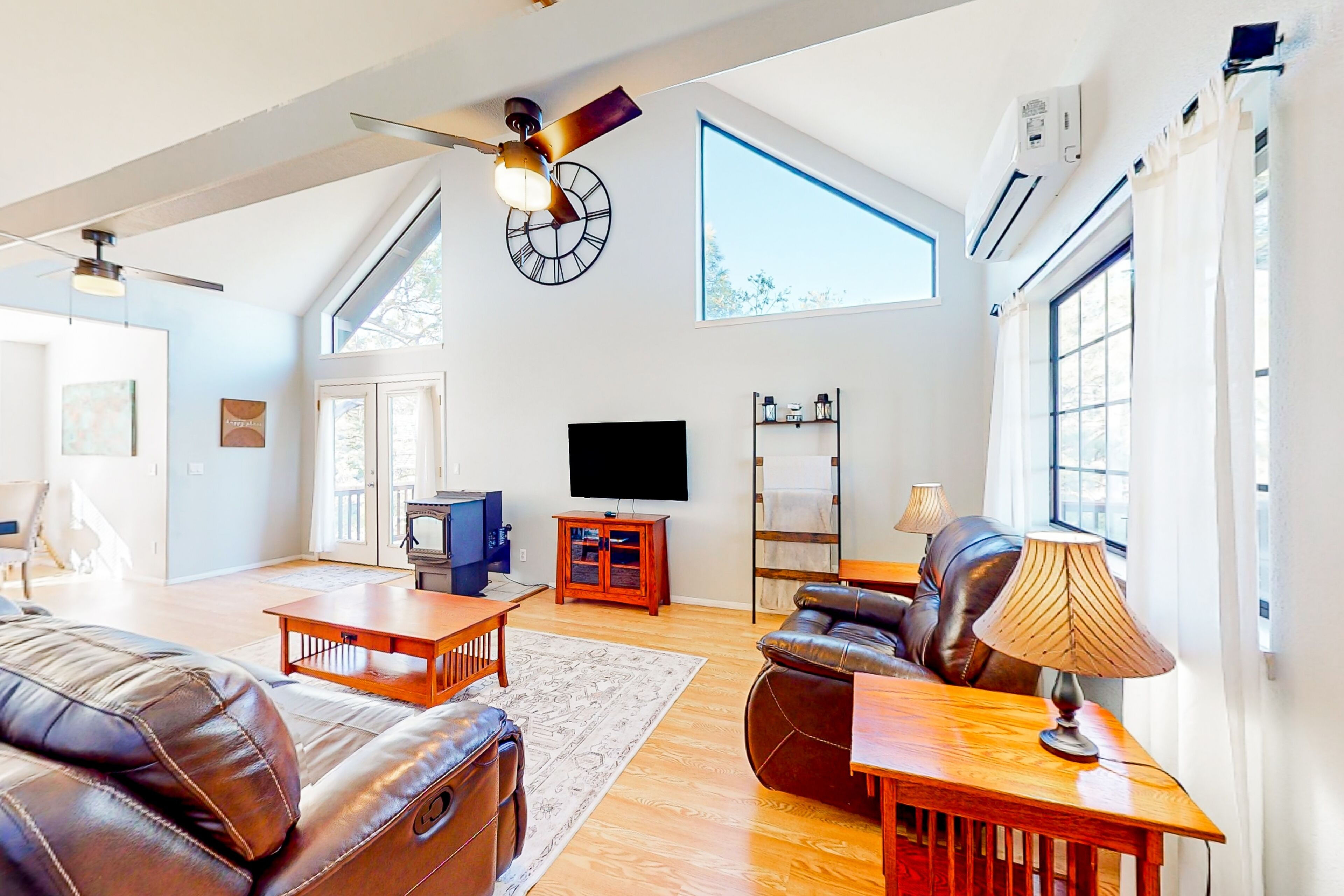 Two-story home with large deck, private bbq grill, and scenic views