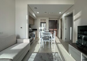 Classic Apartment, 1 Bedroom, Kitchenette, City View | 1 bedroom, pillow-top beds, blackout curtains, soundproofing - Modern 1 BR Golf Vita Damac Hills 1 (Dubai)