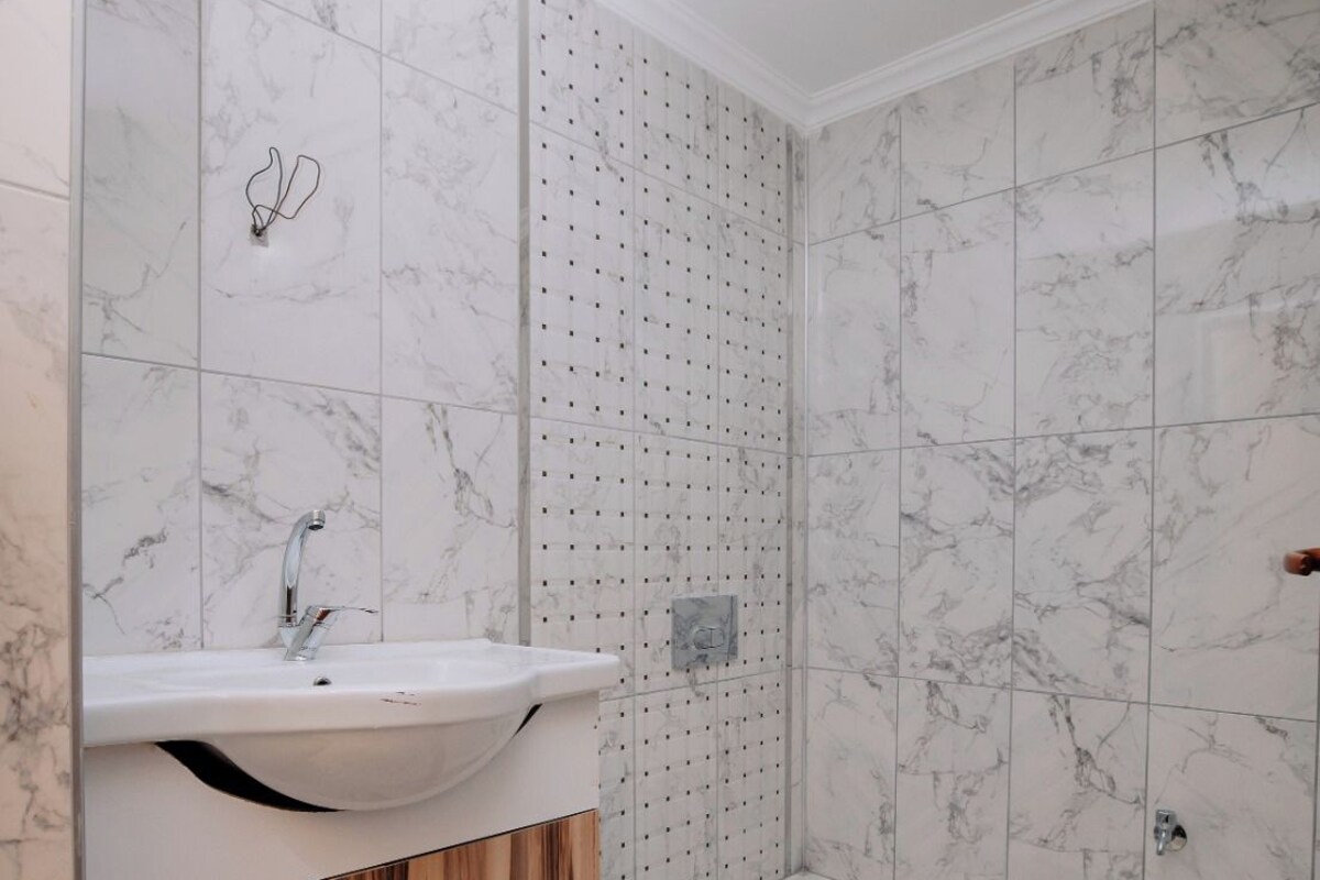 Bathroom | Shower, free toiletries, hair dryer, slippers