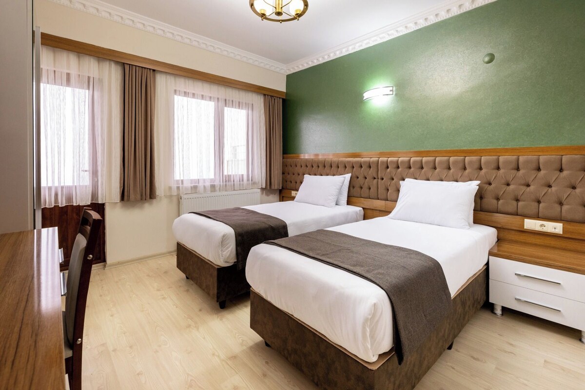 Premium bedding, blackout drapes, soundproofing