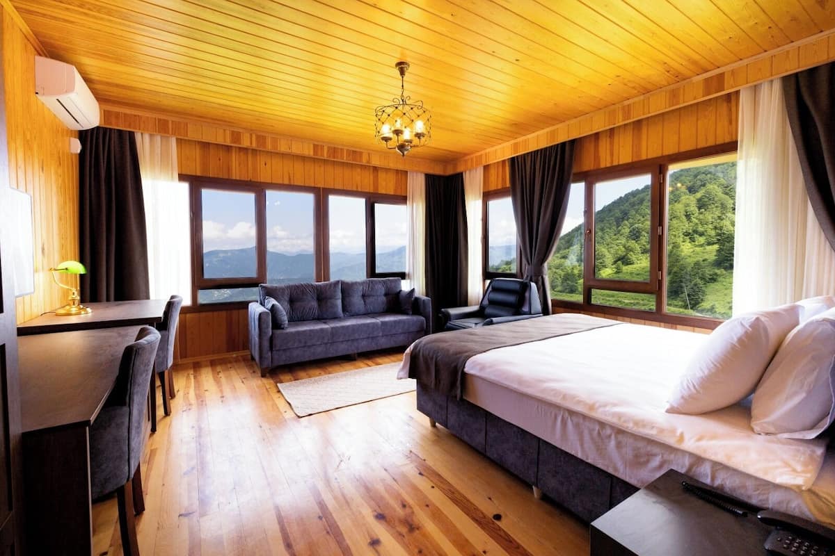 Suite Room | Sengetøy av topp kvalitet, blendingsgardiner og lydisolert