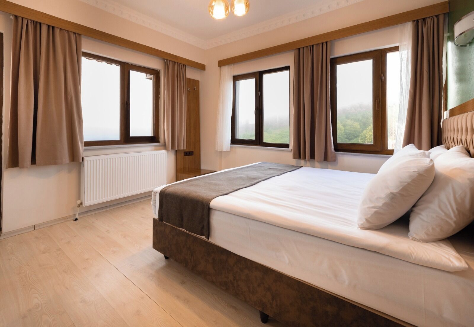 Premium bedding, blackout curtains, soundproofing