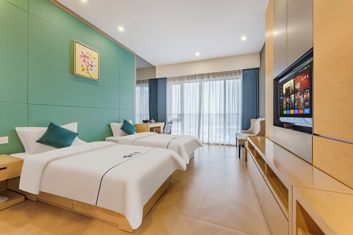 Habitación estándar con 2 camas individuales | Ropa de cama de alta calidad, escritorio, wifi gratis y ropa de cama