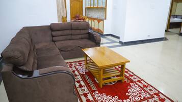 Apartment, 3 Bedrooms | Living area | 53-inch LED TV with digital channels, Netflix, first-run films