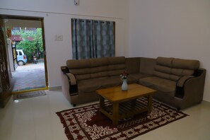 Apartment, 2 Bedrooms | Living area | 53-inch LED TV with digital channels, Netflix, first-run movies - NANDA MOHAN HOMESTAY (Tirupati)