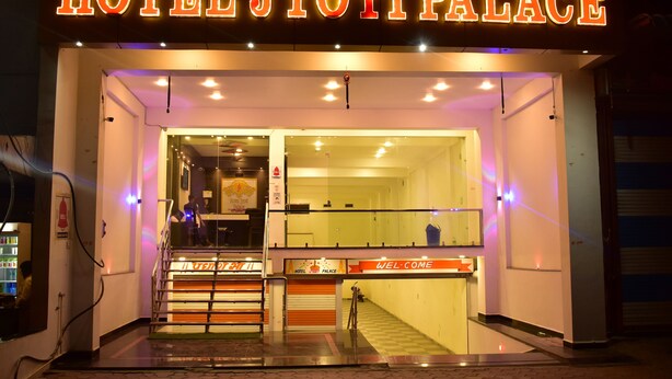 A hotel entrance with a sign reading "HOTEL JYOTI PALACE" and a "WELCOME" sign. - HOTEL JYOTI PALACE (Biaora)
