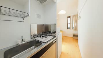 Accommodates two-person, Double Size, Non Smoking | Private kitchen | Full-size fridge, microwave, stovetop, electric kettle