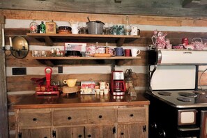 Fridge, microwave, stovetop, coffee/tea maker