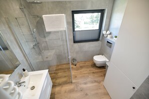 Shower, hair dryer, towels, soap