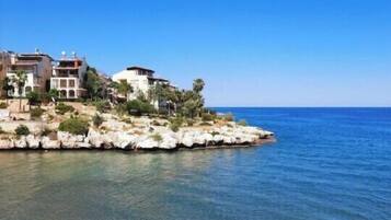 On the beach, sun-loungers, beach umbrellas