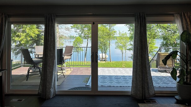 Unclassified image, 1 of 27, button - Beautiful deck overlooking Maple Lake with private, shared dock. (Maple Lake)