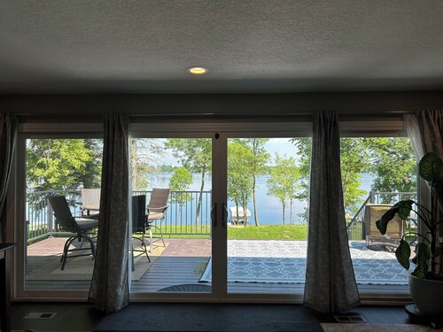 Beautiful deck overlooking Maple Lake with private, shared dock.