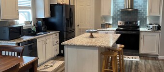 Ranch house, cottage, pool, deck, small basketball court, private gated entrance