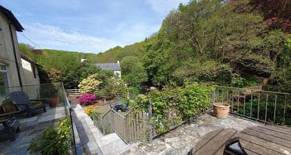 River side cottage ideally situated to explore Exmoor and the North Devon Coast.