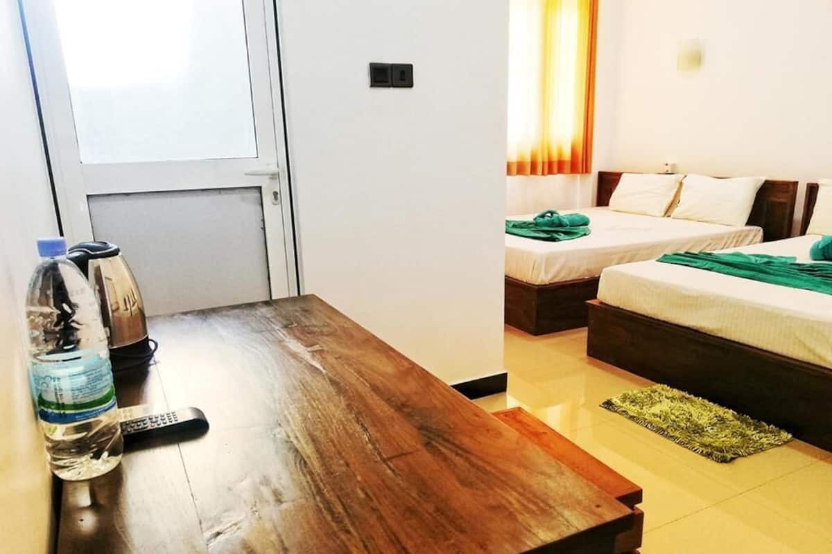 Suite Deluxe, vista giardino | 1 camera, insonorizzazione, Wi-Fi gratuito