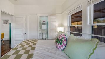 1 bedroom, desk, iron/ironing board, travel crib