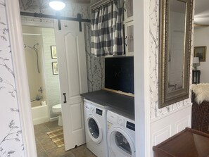 Hair dryer, towels, soap, toilet paper