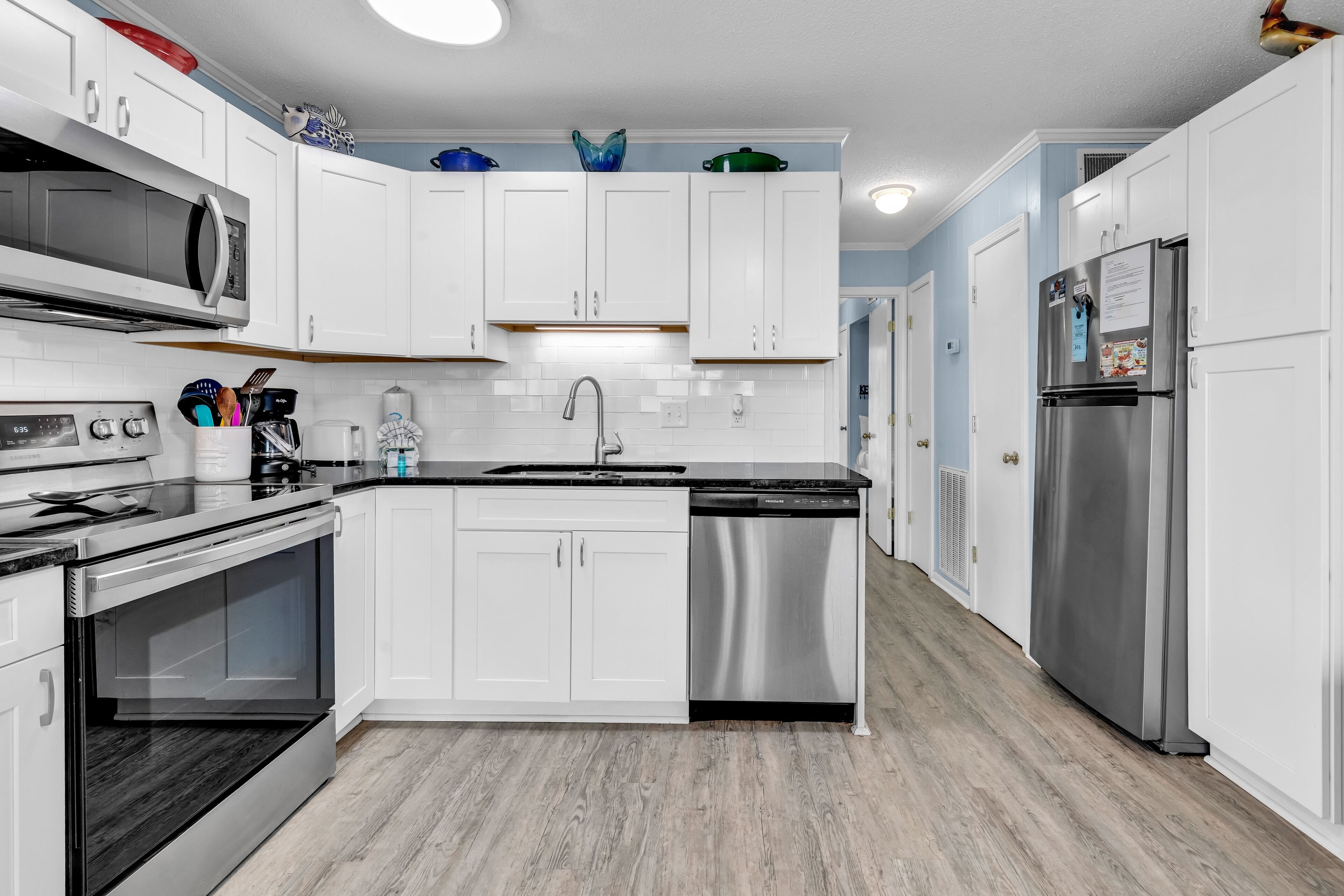 Signature Condo, Beach View | Private kitchen | Fridge, microwave, oven, stovetop