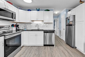 Signature Condo, Beach View | Private kitchen | Fridge, microwave, oven, stovetop - Sea Cabin (North Myrtle Beach)