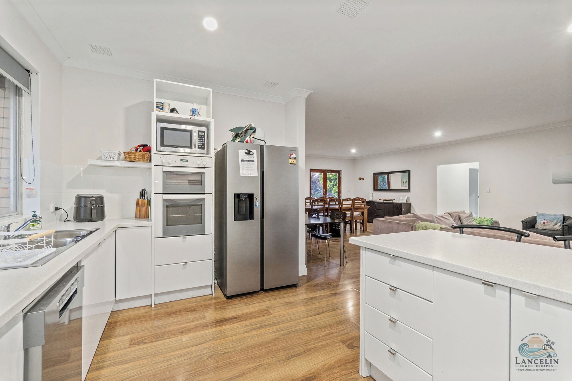 Fridge, stovetop, dishwasher, coffee/tea maker
